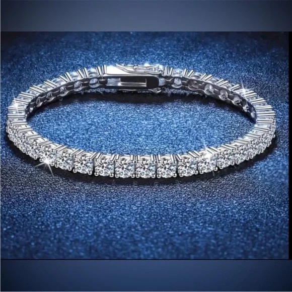 NWT 5 carat STUNNING
Sterling Silver 3mm Moissanite
Tennis Bracelet - Picture 3 of 5